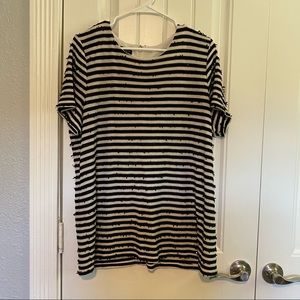 Sparkly black and cream short-sleeved sweater.